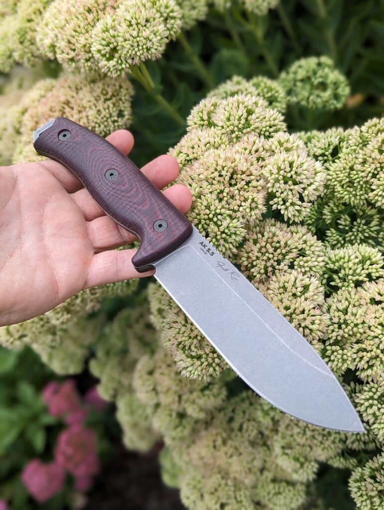 Knife with a brown, textured handle