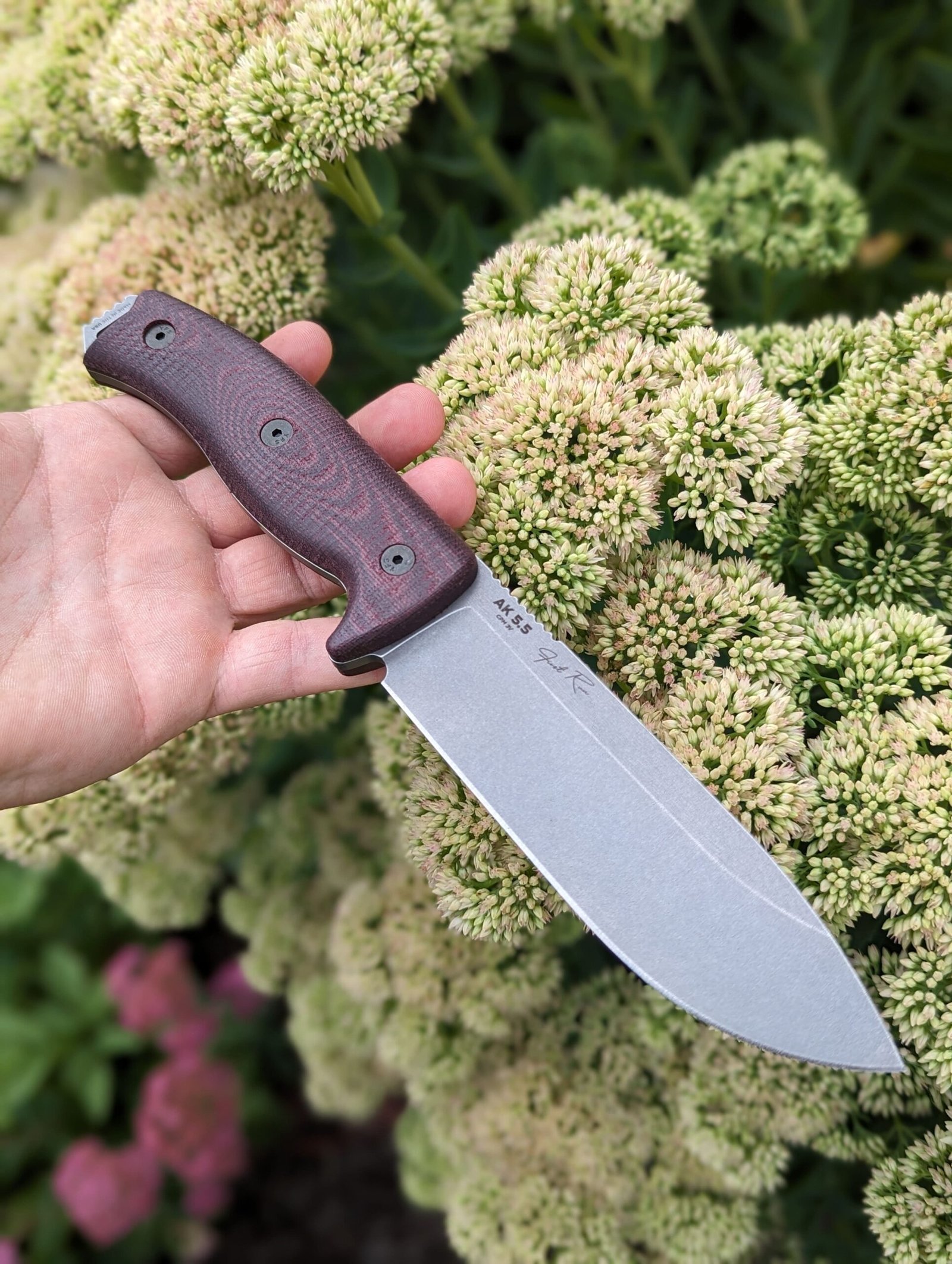 Knife with a brown, textured handle