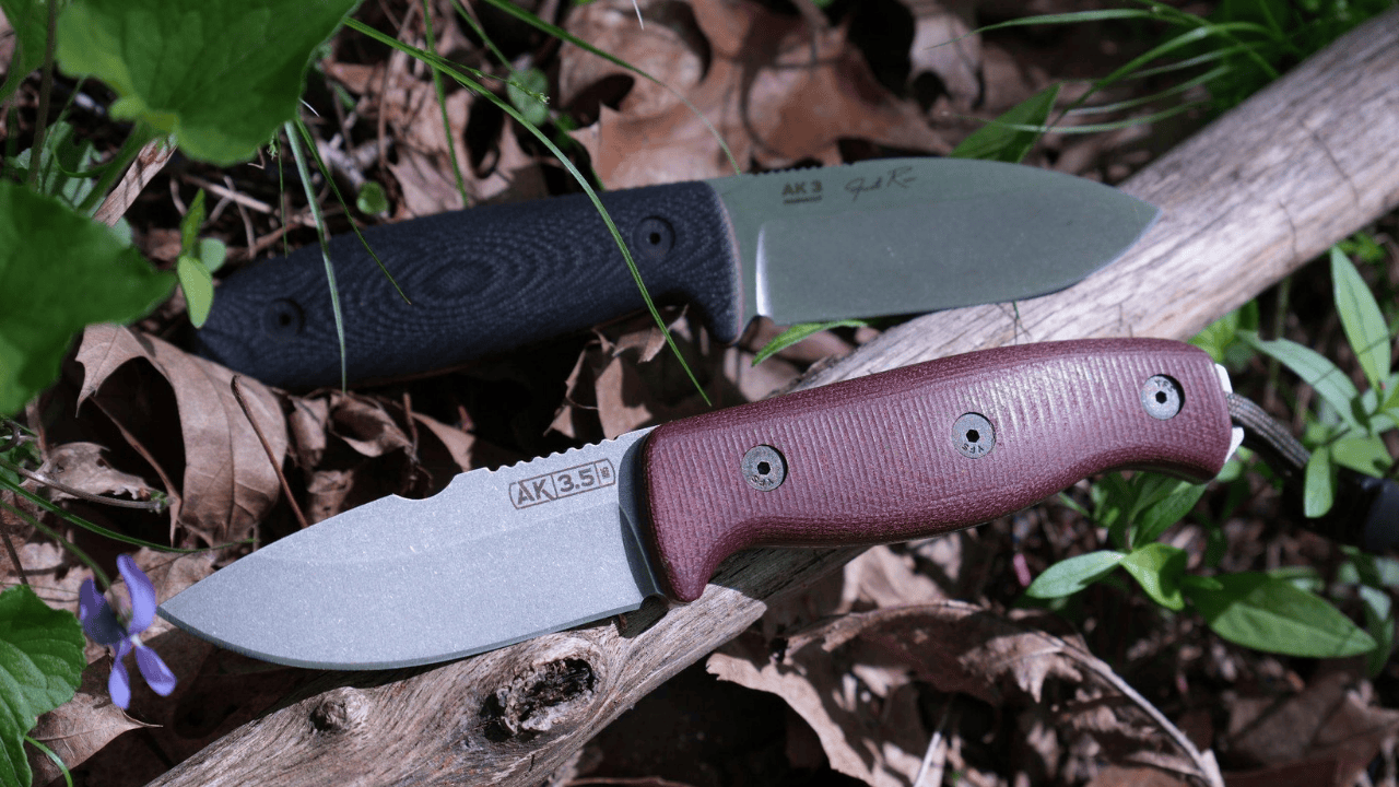 two wood carving knives on the ground