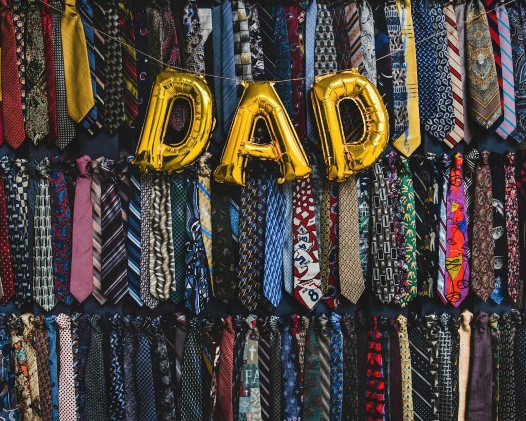 Dad balloons hanging over ties