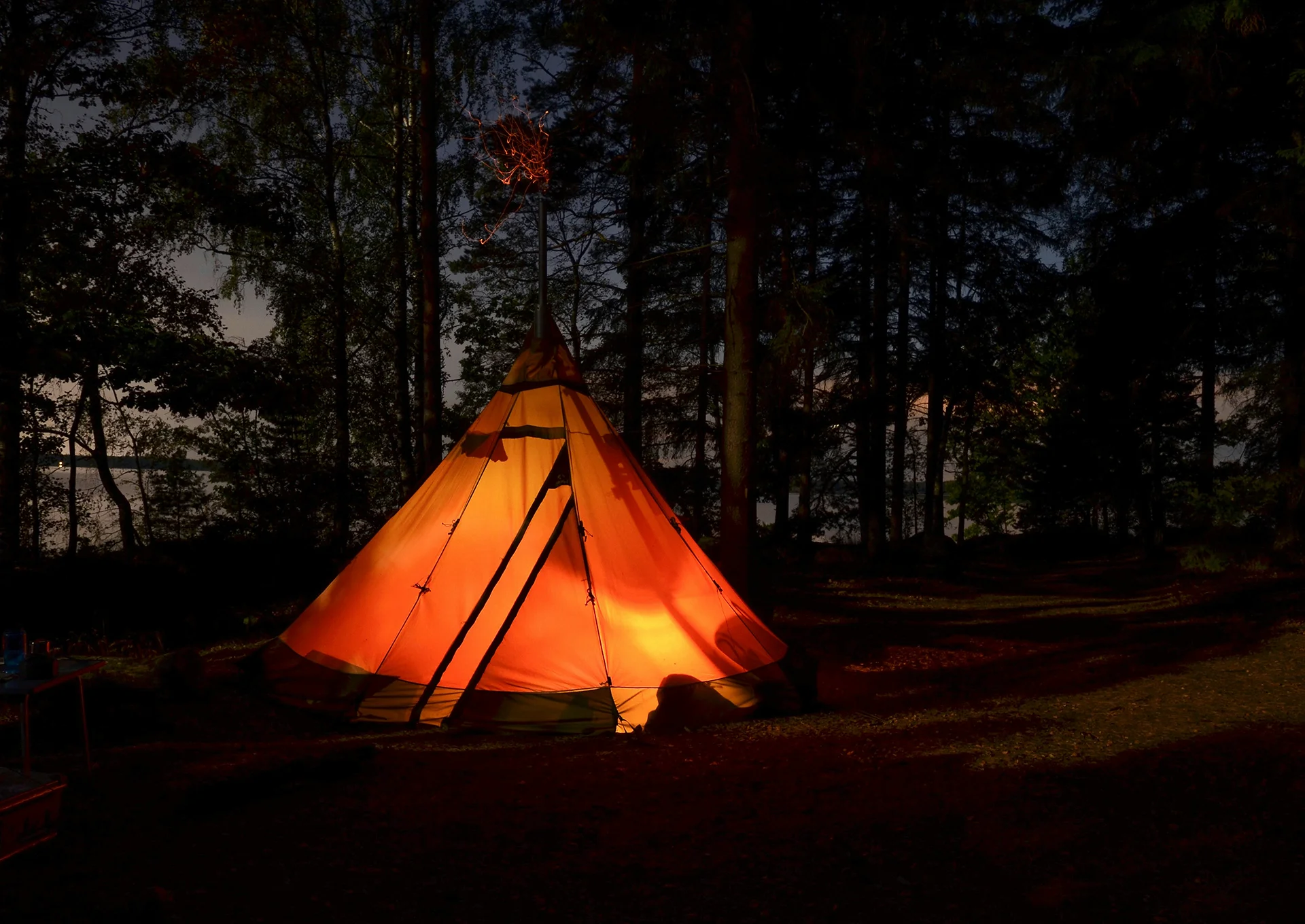 Camping in a tent in a forest
